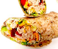 mixed vegetable lunch wrap on a whole grain tortilla